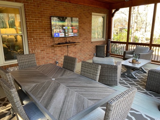 Brookview Court screened porch dining area